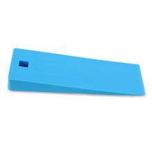 Blue demolding wedge with hole for hanging.