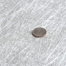 Chopped strand mat compatible with polyester and vinyl ester resins. Fiberglass fibers held together by styrene binder.