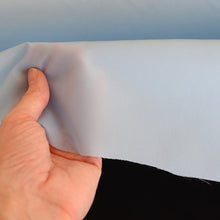 Light blue peel ply for vacuum bagging.