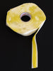 Roll of yellow vacuum bagging sealant tape.